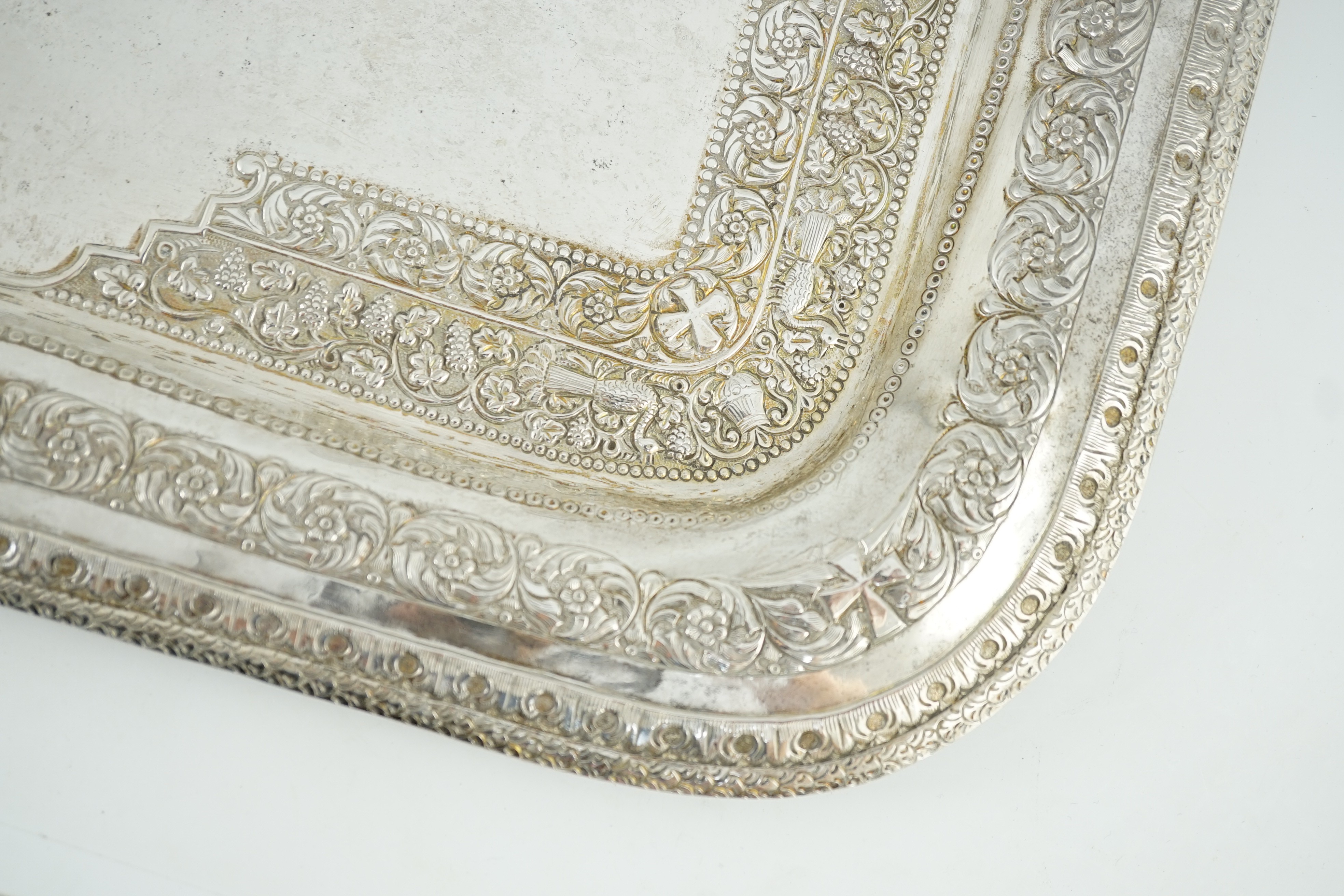 A 20th century Indian white metal rounded rectangular tea tray